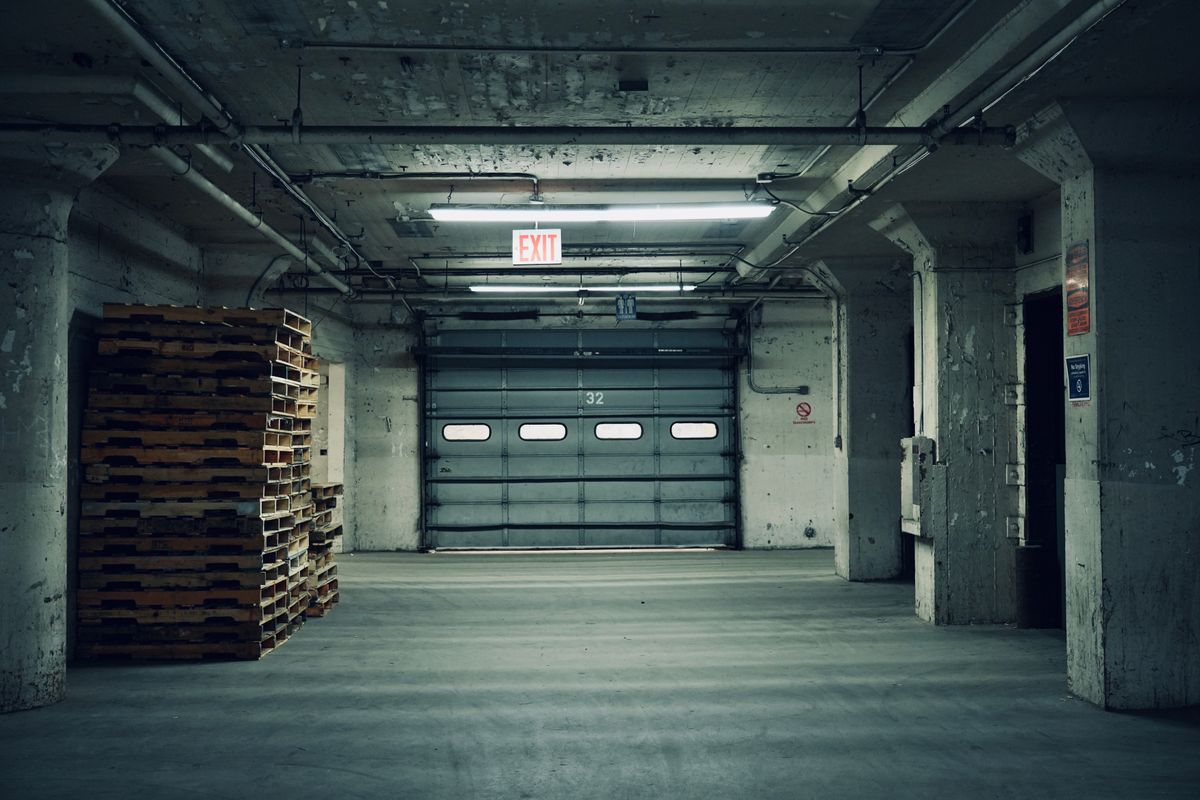 Warehouse interior with a commercial overhead sectional door