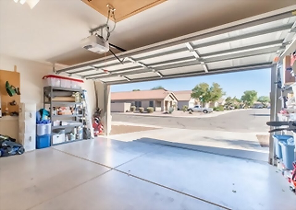 Garage door repair technician at work